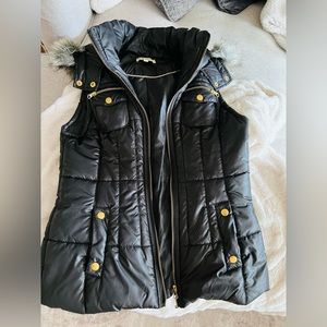 Black puffy vest